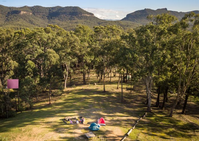 Campers enjoying a scenic view at Private Town campground, Yerranderie Regional Park