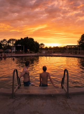 Couple enjoying a visit to the Lightning Ridge Bore Baths, Lightning Ridge
